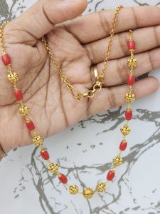 Synthetic coral beads with antique gold beads necklace