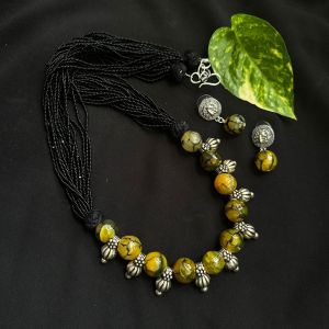 Gemstone Necklace: Black Seed Beads With Onyx With Kohlapuri Charms, Yellow And Black