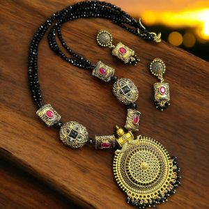 Black Victorian necklace with gold pendant