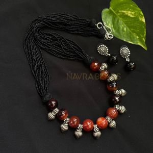 Gemstone Necklace: Black Seed Beads With Onyx With Kohlapuri Charms, Brown And Black