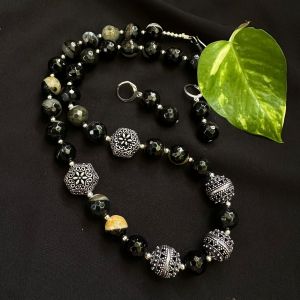 Onyx beads necklace with hollow beads.