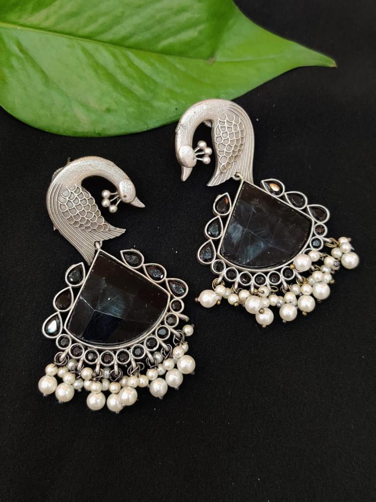 Buy AD Black Artificial Gemstone Golden Earrings for Women at Amazonin